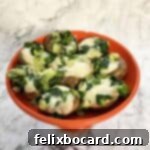 small round dish of brie stuffed mushrooms