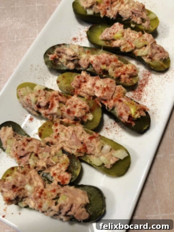 Tuna salad boats elegantly arranged on a white platter