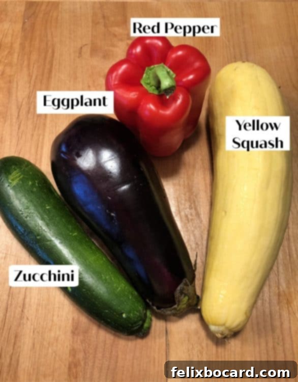 Underground Gourmet 2 Fresh yellow squash, eggplant, red pepper and zucchini ready for slicing