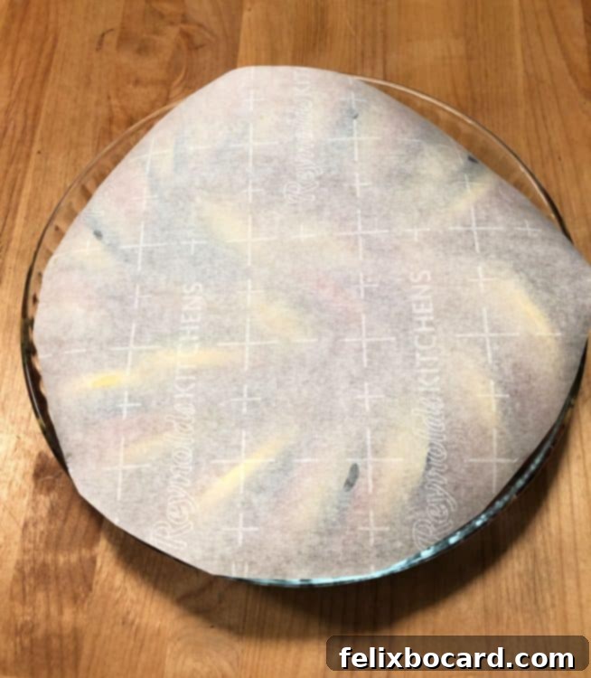 Underground Gourmet 5 Parchment paper covering the arranged ratatouille vegetables in the dish