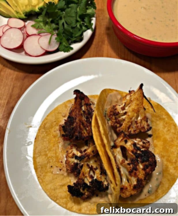Corn tortilla with cashew crema and roasted cauliflower, awaiting fresh garnishes