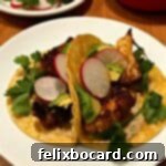 2 cauliflower tacos on a white plate