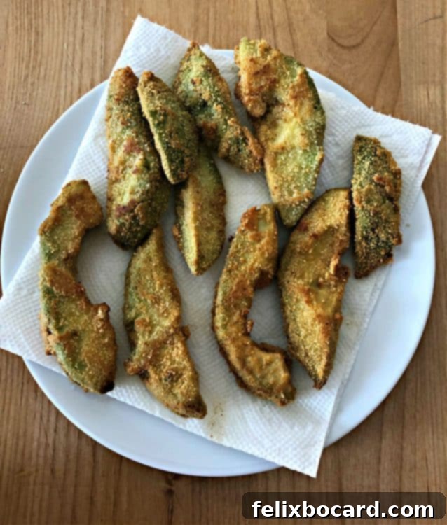 avocado fries on a paper towel lined plate
