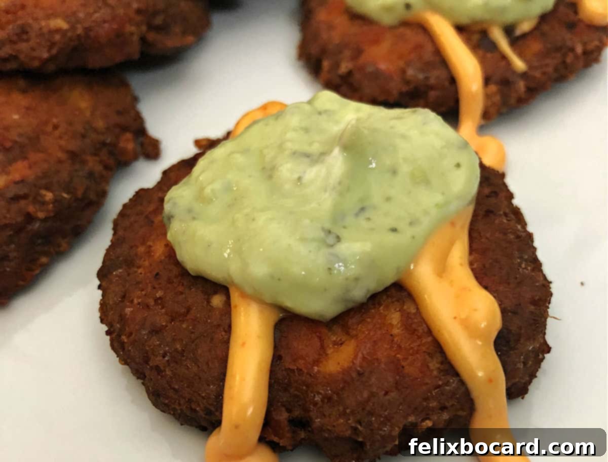 Crispy keto salmon patty with fresh herbs.