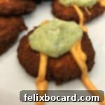 Crispy keto salmon patties on a white plate