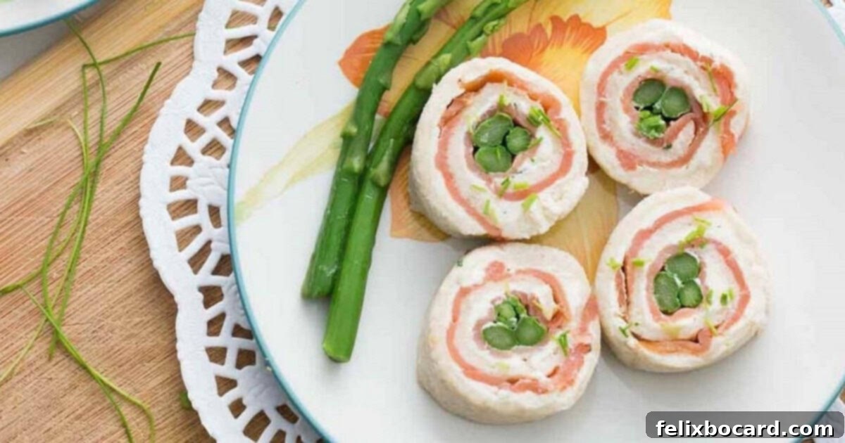 Asparagus Smoked Salmon Pinwheels with lemon chive cream cheese, elegant tea sandwiches perfect for special occasions.