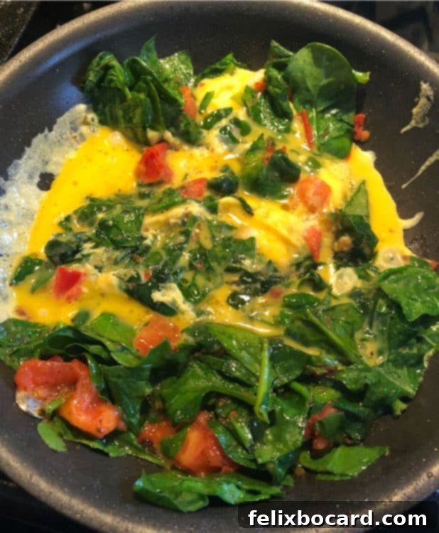 Supercharged Eggs 6 scrambled egg added to skillet