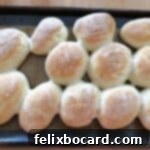 Deli Style Sandwich Rolls 9 baked rolls on a baking sheet