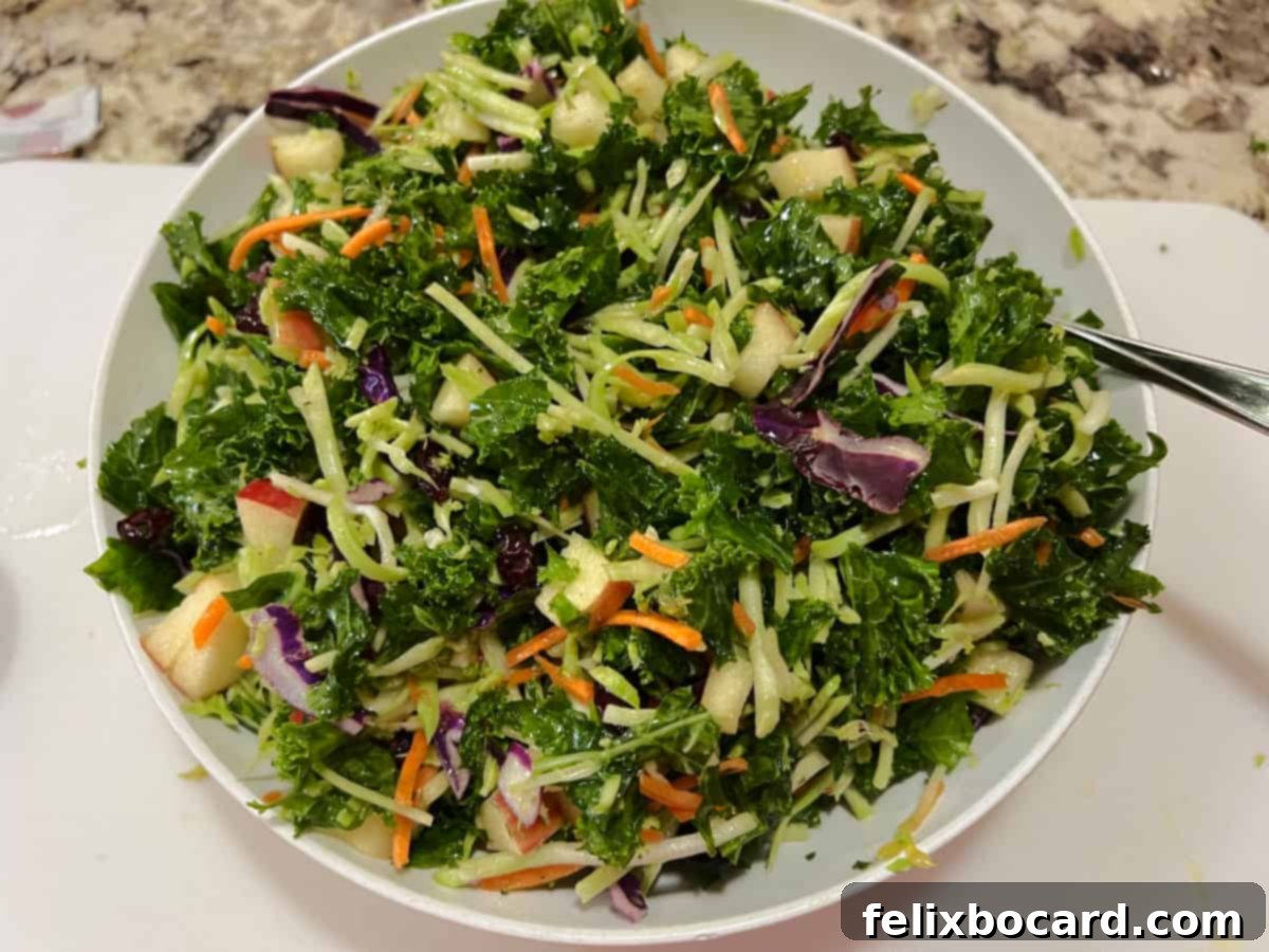 broccoli kale salad mixed in a bowl.