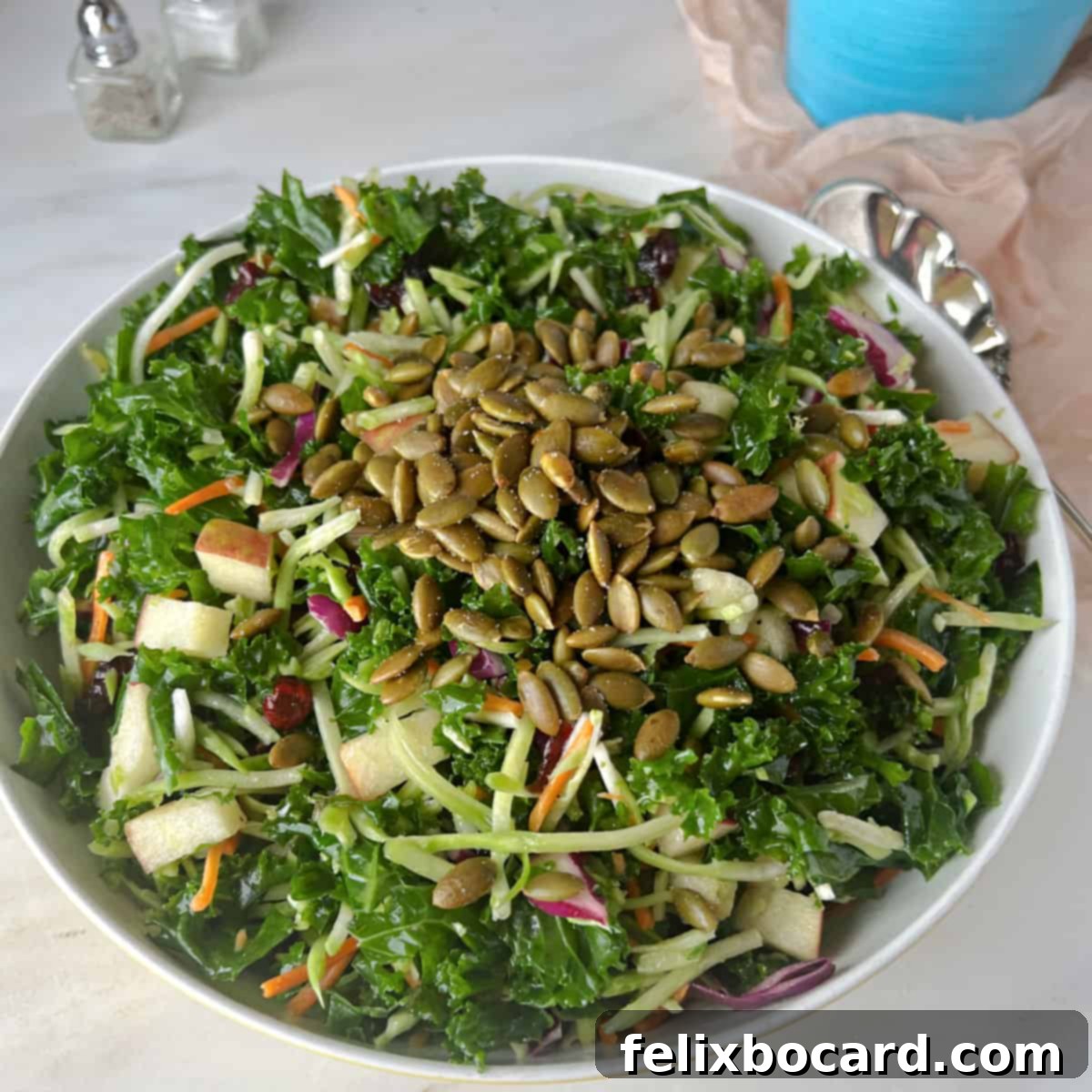 Broccoli kale salad with pepitas added.