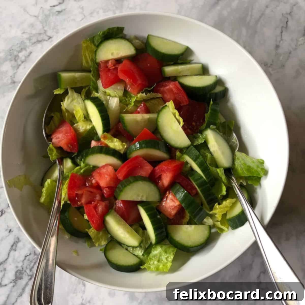 A simple salad dressed with oil and vinegar.