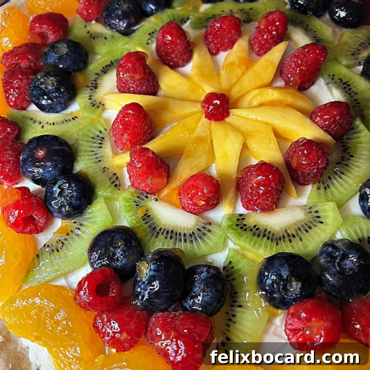 Close up image of a fruit pizza.