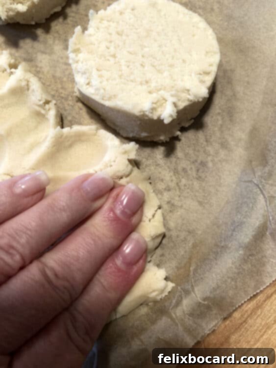 pressing dough into pan
