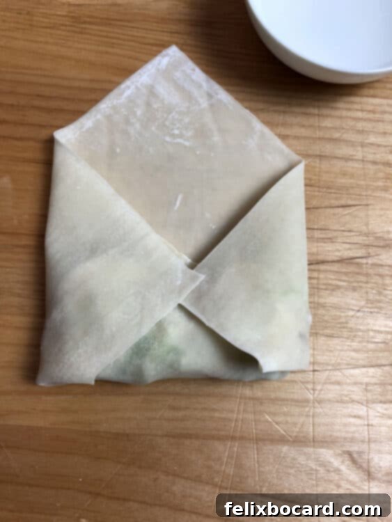 both sides of wrapper folded in