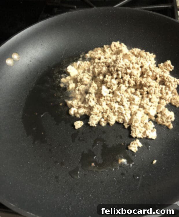 Unwrapped Veggie Egg Roll Bowl 2 crumbled tofu in a skillet