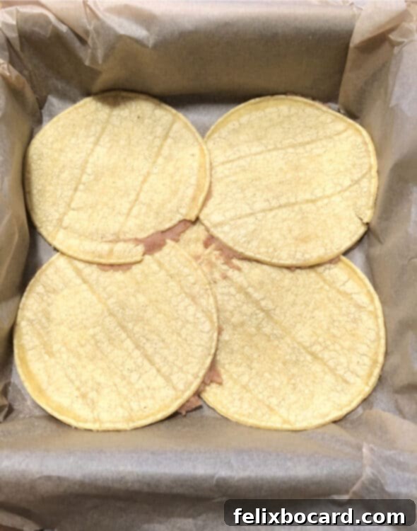 Burrito Bake 7 layer of tortillas in pan