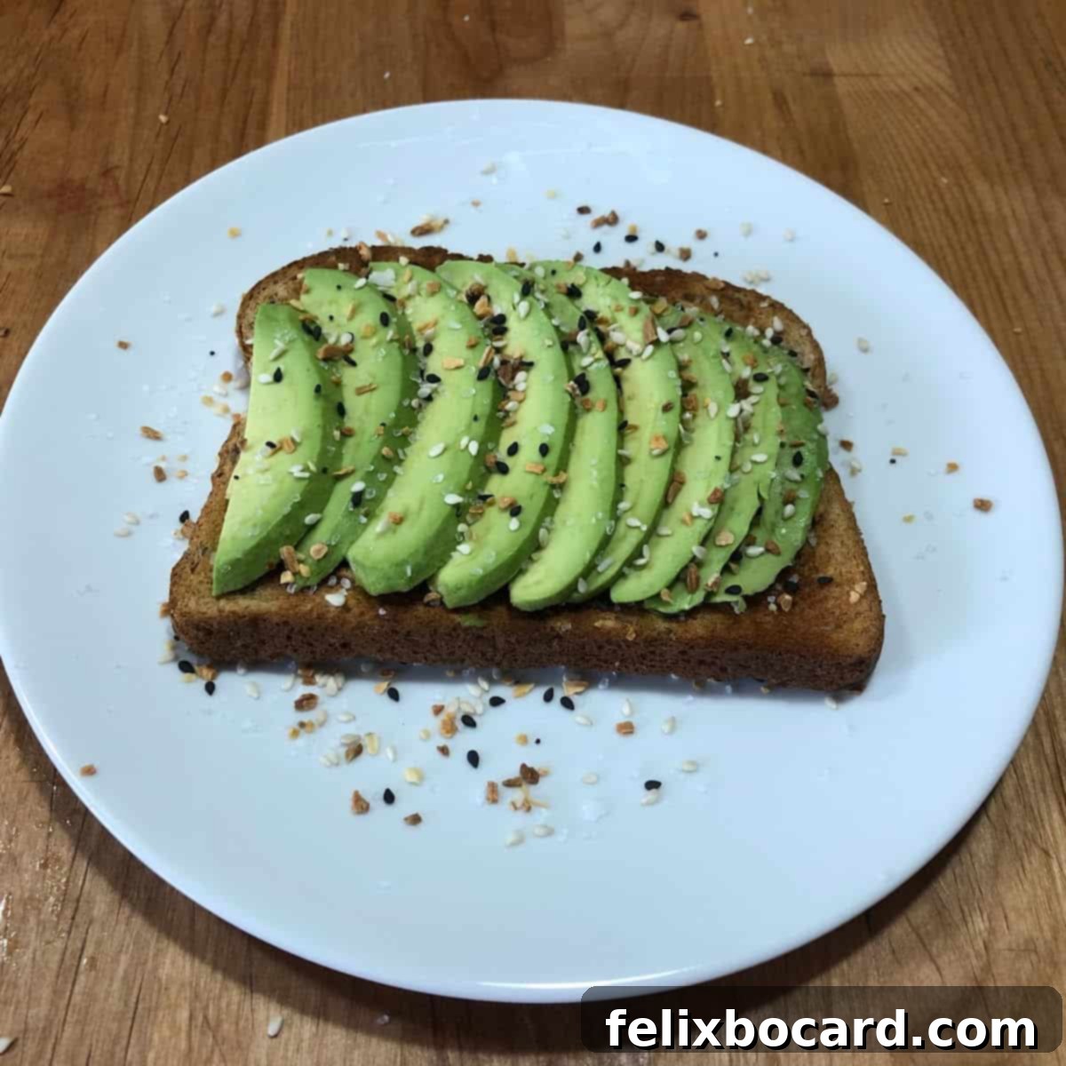 13 Creative Avocado Toast Recipes 2 Avocado toast sprinkled with everything bagel seasoning, highlighting healthy and delicious breakfast options.
