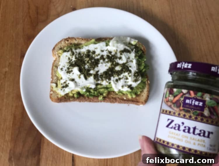 13 Creative Avocado Toast Recipes 15 Avocado toast layered with creamy Greek yogurt and sprinkled with aromatic Za'atar seasoning for a unique Mediterranean twist.