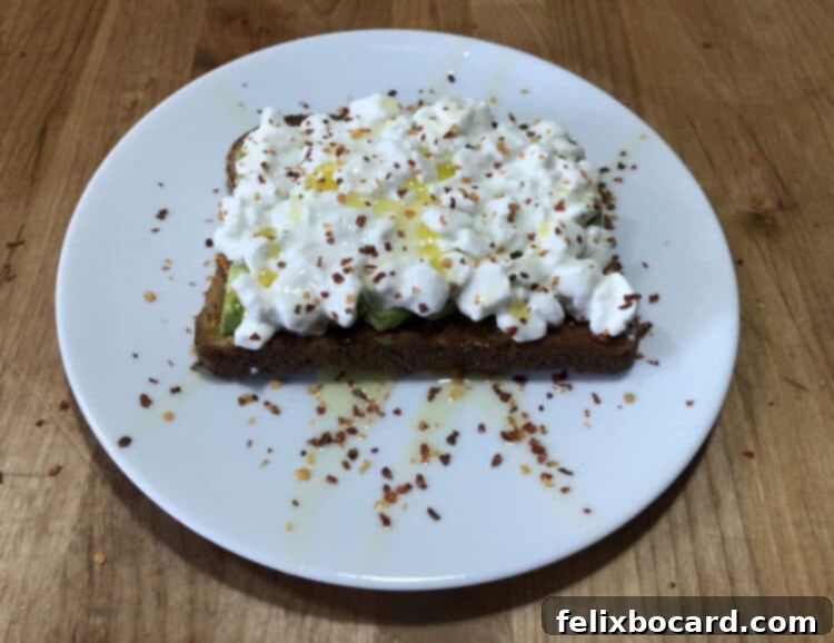 13 Creative Avocado Toast Recipes 6 Avocado toast layered with cottage cheese and sprinkled with red pepper flakes for a touch of spice.