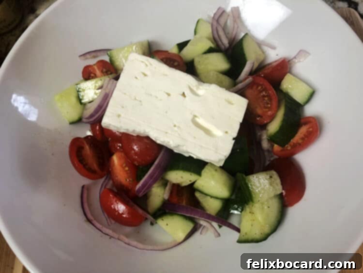 slice of fets cheese on top of the salad