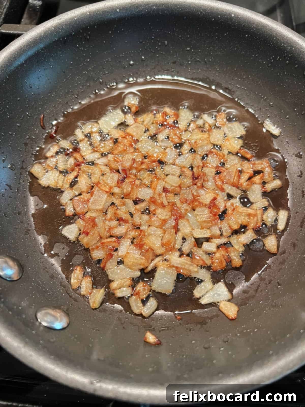 Caramelized onions in a small skillet.