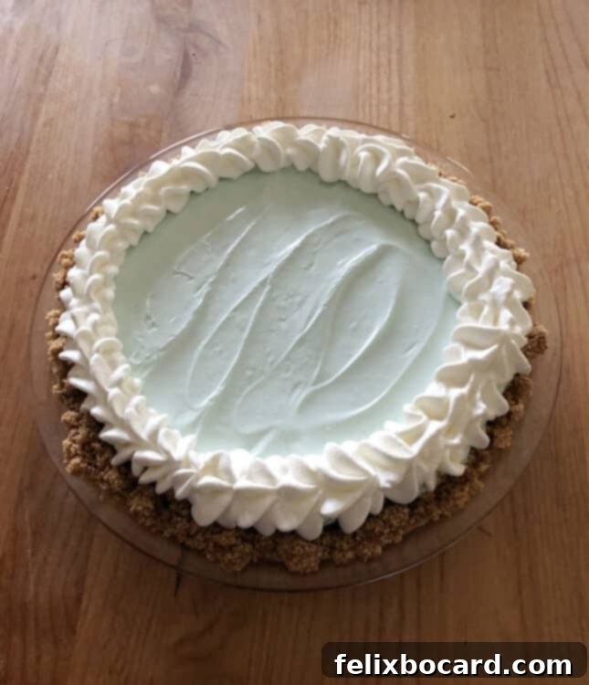 koolaid pie decorated with piped whipped cream