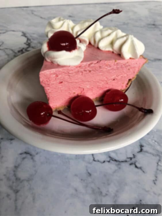 slice of cherry koolaid pie on a small plate