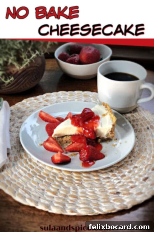 Oven-Free Cheesecake Delight 5 A vibrant Pinterest pin image for a no-bake cheesecake recipe, featuring a delectable slice with fresh berries, encouraging users to save it for later.