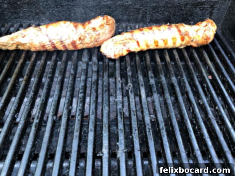 Succulent Grilled Pork Tenderloin 5 2 pork tenderloins moved to the back of the grill for indirect heat