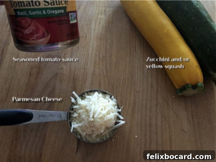 Simple ingredients laid out for microwave zucchini and yellow squash: fresh squash, tomato sauce, and Parmesan cheese.