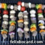 Beef or steak kabobs cooking on the grill