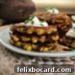 Golden Zucchini Corn Fritters 6 Zucchini corn fritters stacked on a plate