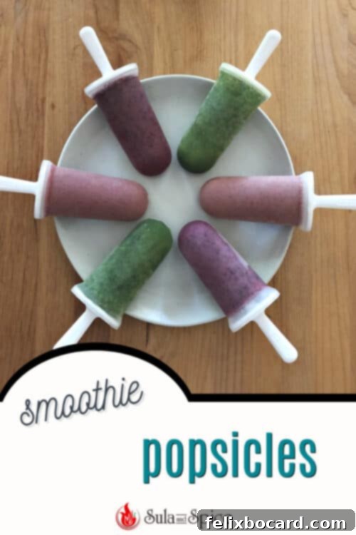 A beautifully composed image featuring homemade smoothie popsicles, perfect for pinning and sharing healthy treat ideas.