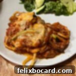 Butternut squash and zoodle spaghetti bake served on a plate, highlighting the delicious textures.