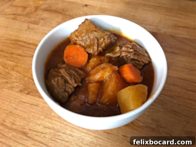 beef stew in a small white bowl