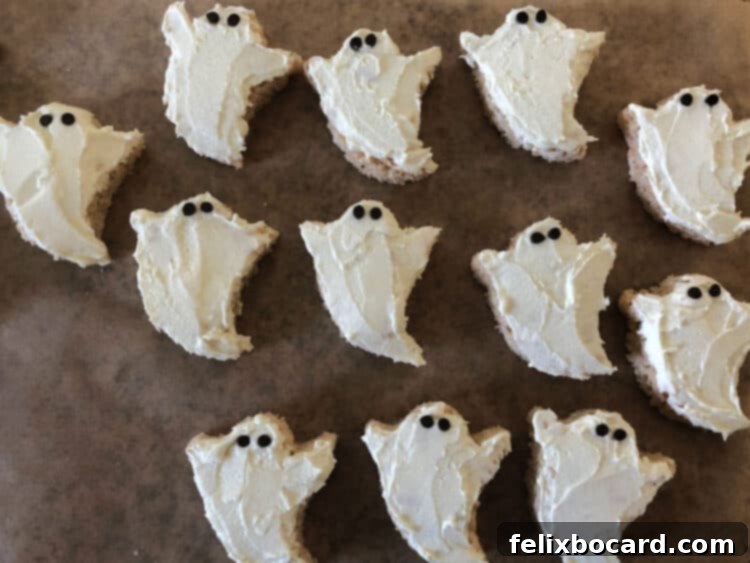 Spooky Ghost Rice Krispie Treats 9 group of decorated rice krispie treat ghosts