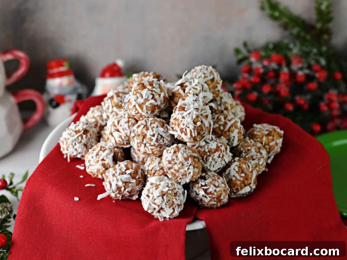 Serving plate covered in red napkins holding a stack of coconut date balls.