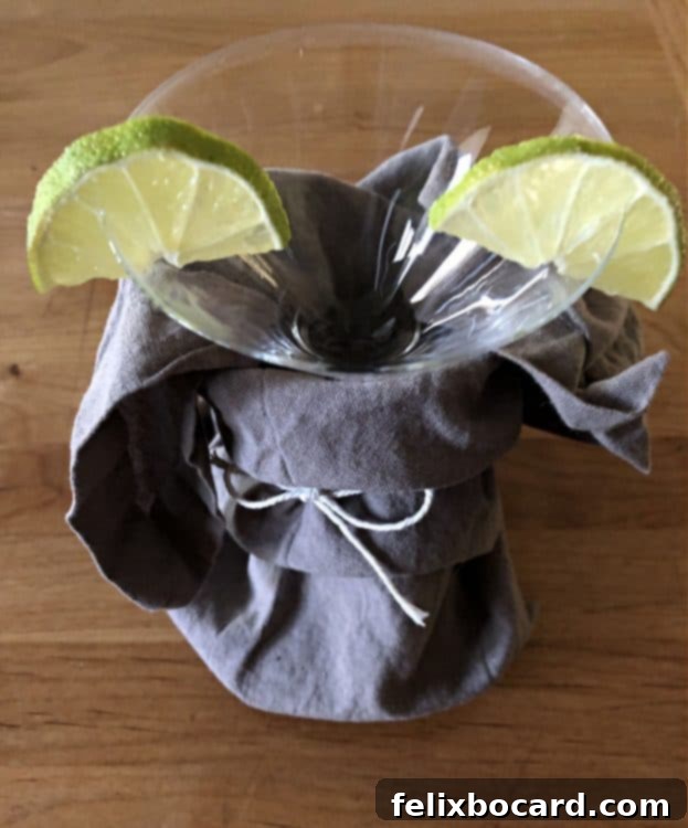 lime slices added to glass