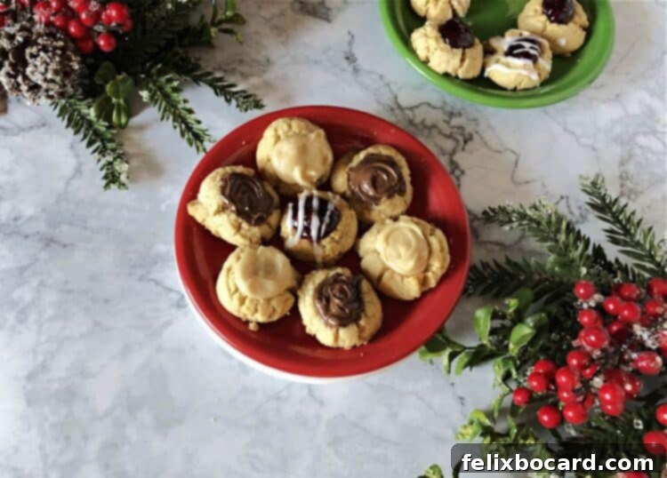 Assortment of Thumbprint cookies on a red plate