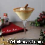eggnog and baileys cocktail in a martini glass