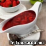 Simple Frozen Berry Sauce 9 Gravy boat full of berry sauce made from frozen berries.