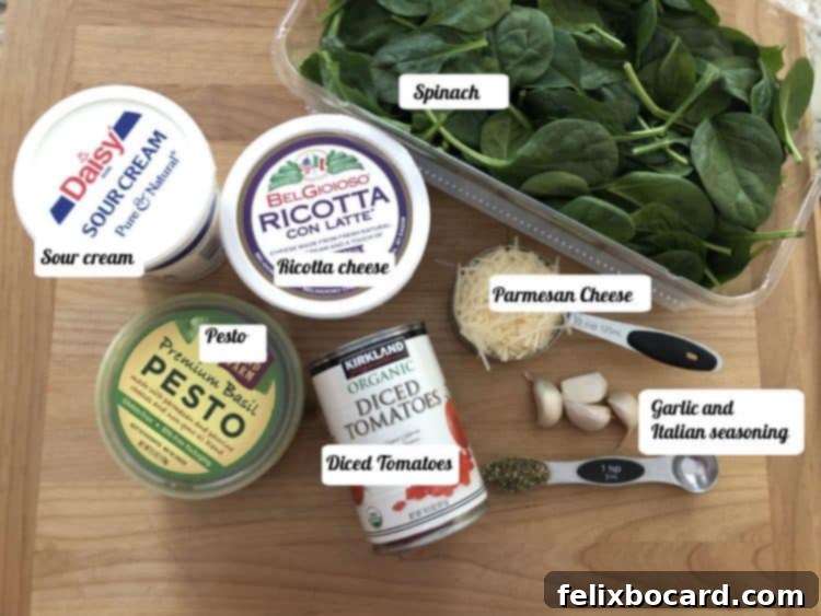 Ingredients: spinach, ricotta cheese, sour cream, Parmesan cheese, pesto, tomatoes, garlic and seasoning