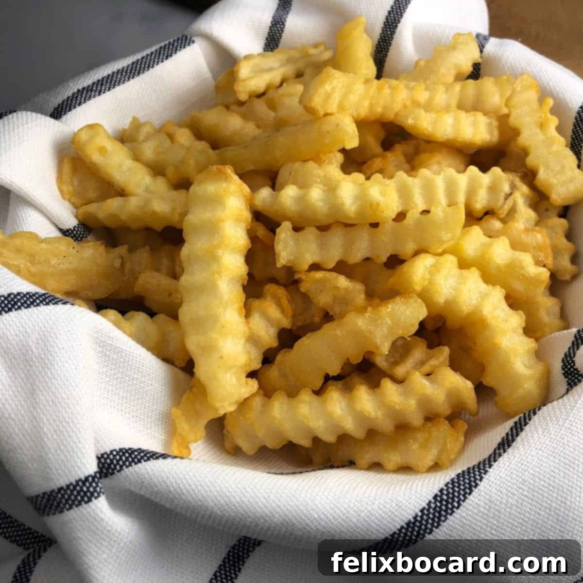 Crispy Air Fryer Frozen French Fries 2 french fries cooked from frozen with an Instant pot air fryer lid.