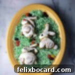 Bunny cinnamon rolls on a bed of edible easter grass