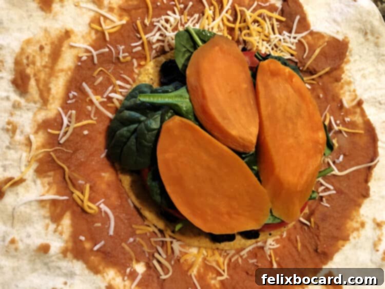 spinach and sweet potato slices added to tostada