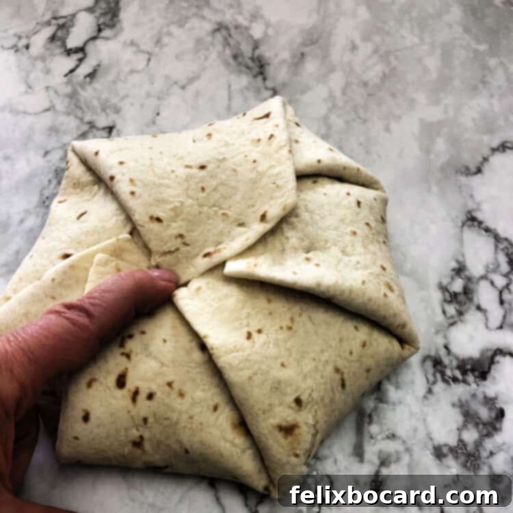 all edges folded in to form the crunch wrap
