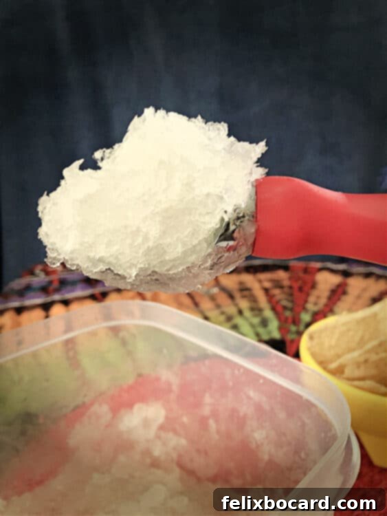 an ice cream scoop full of the margarita slush