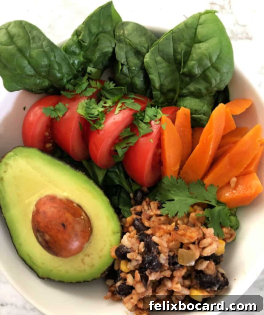 Sweet Potato Boats Made Easy 2 Vibrant burrito bowl featuring brown rice, black beans, corn, avocado, and salsa, a great inspiration for stuffed sweet potatoes.