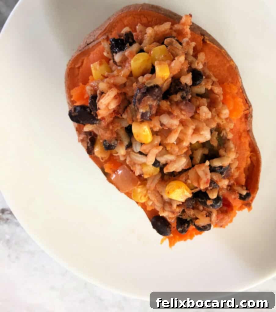 Sweet Potato Boats Made Easy 6 Stuffed sweet potato with a generous serving of rice and bean mixture.