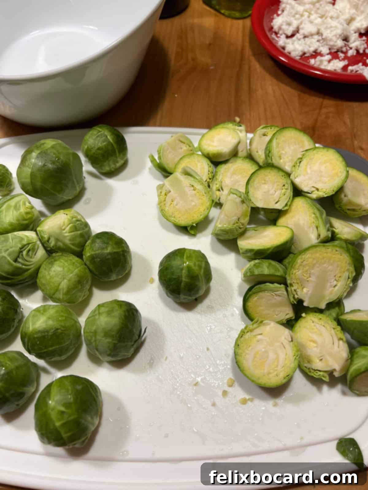 Roasted Brussels Sprouts with Tangy Goat Cheese and Balsamic Glaze 4 Cutting up the Brussels sprouts.
